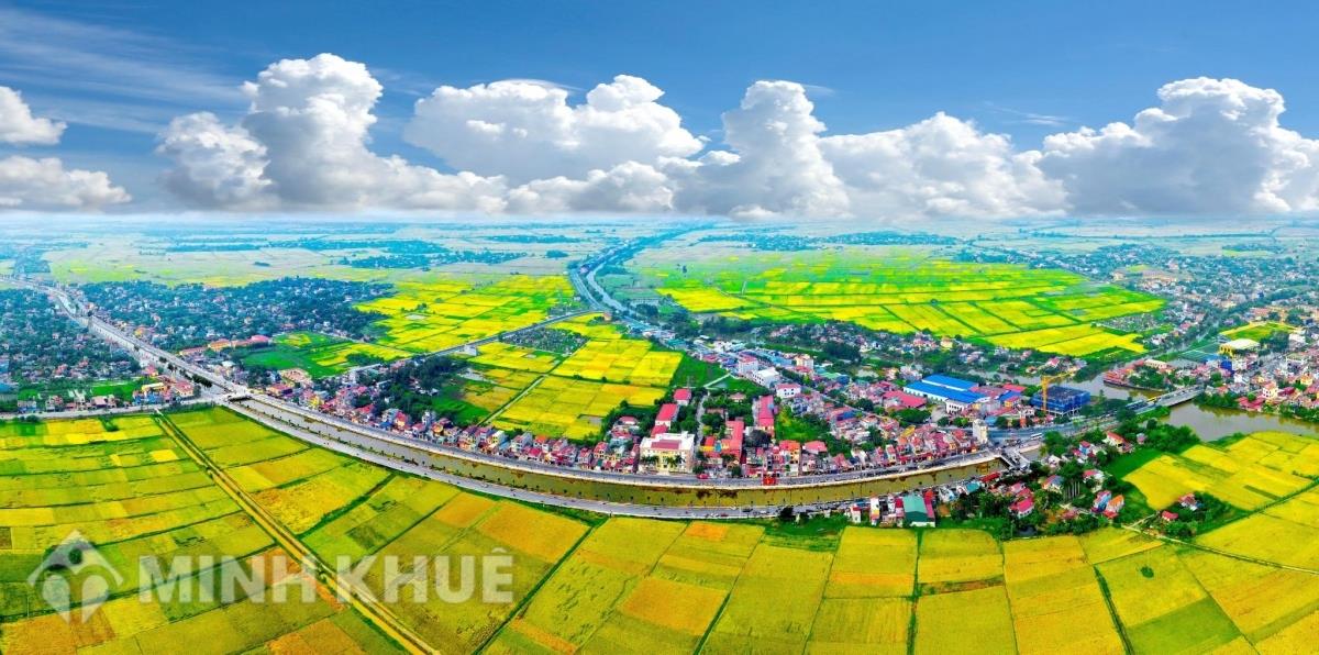 An aerial view of the Red River Delta — verdant rice paddies and an intricate web of waterways