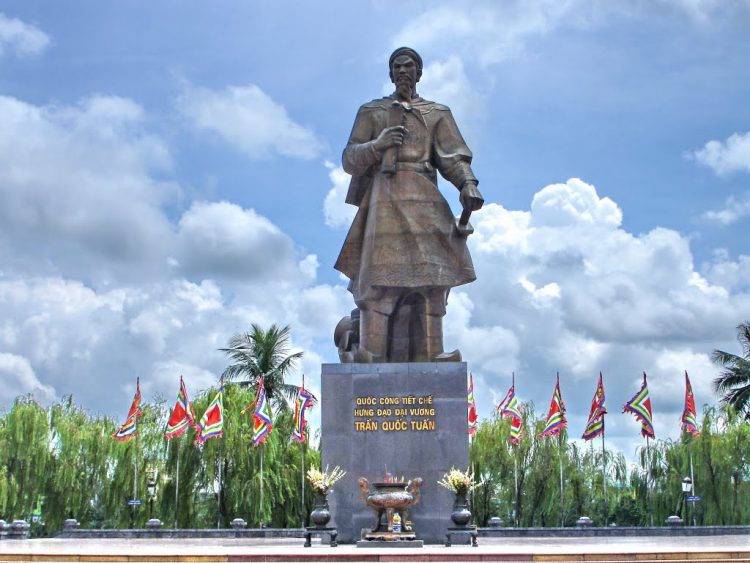 A statue or painting of Trần Hưng Đạo — the supreme commander who repelled the 2nd and 3rd Mongol invasions