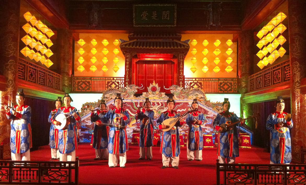 A Huế royal court orchestra performing in traditional antique robes