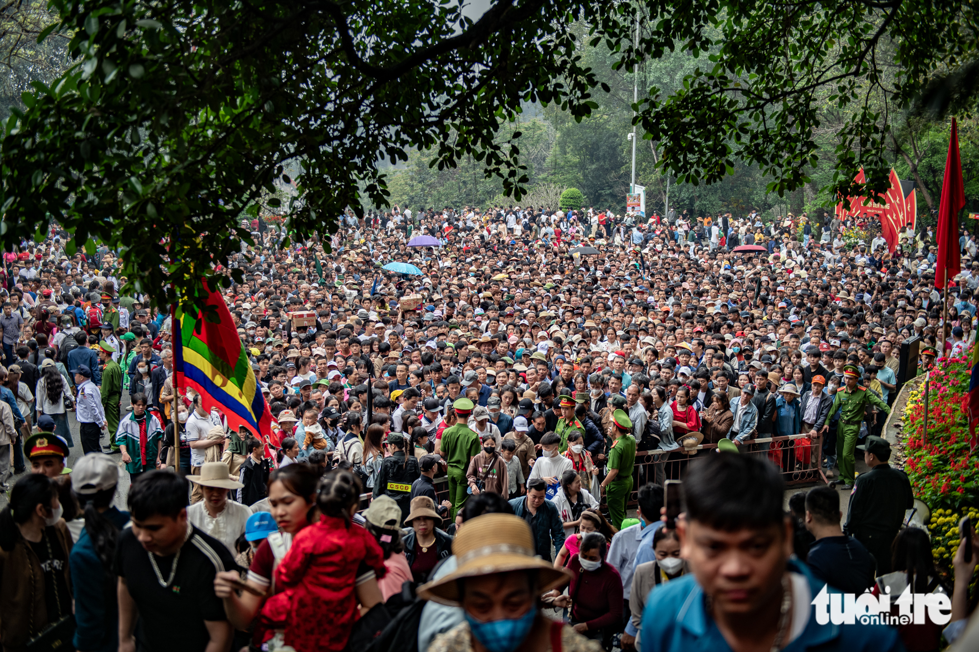 A sea of pilgrims climbing the mountain to the Hung Temple