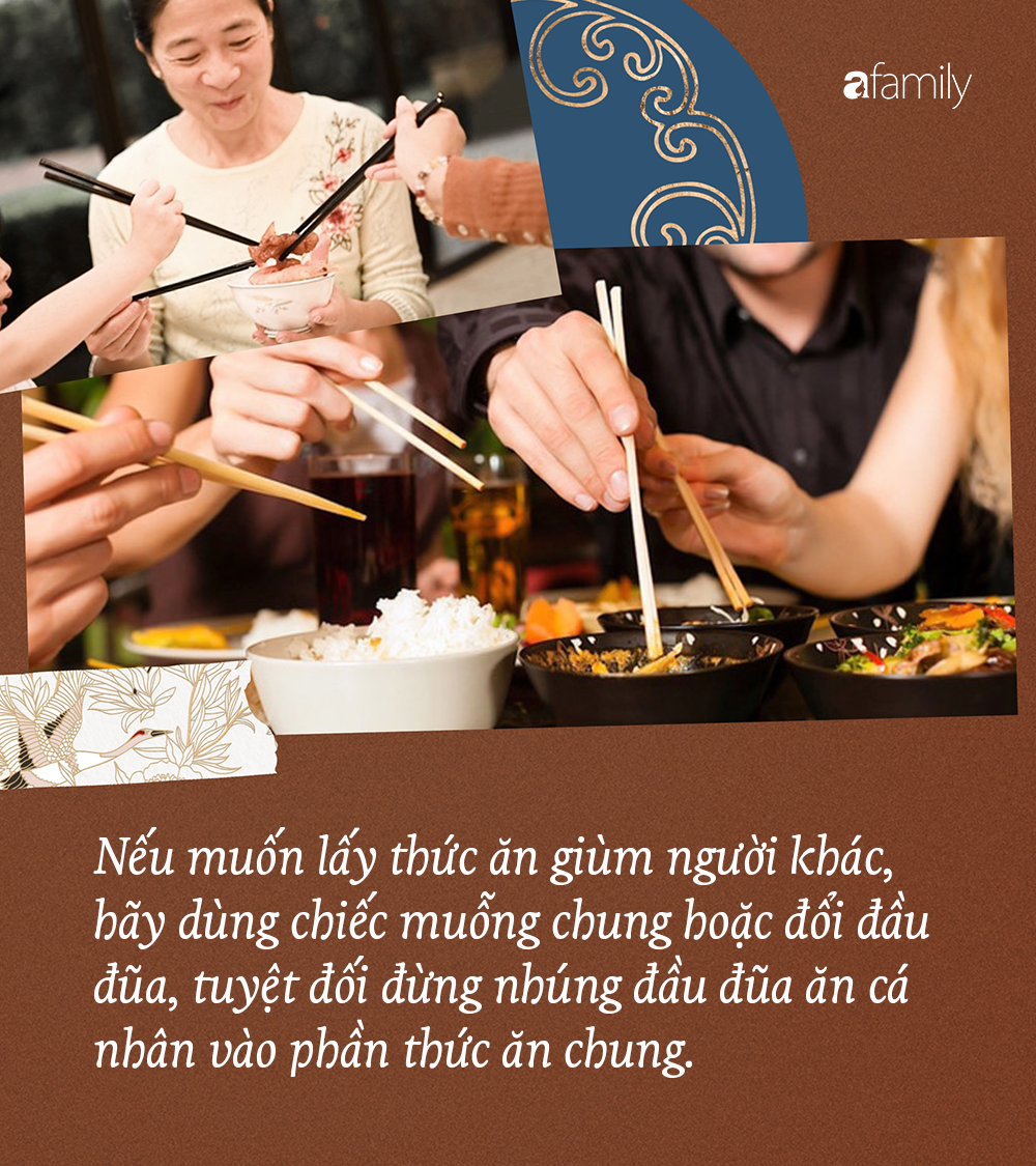 A Vietnamese mother placing a delicious piece of food into her child's bowl — a natural act of care