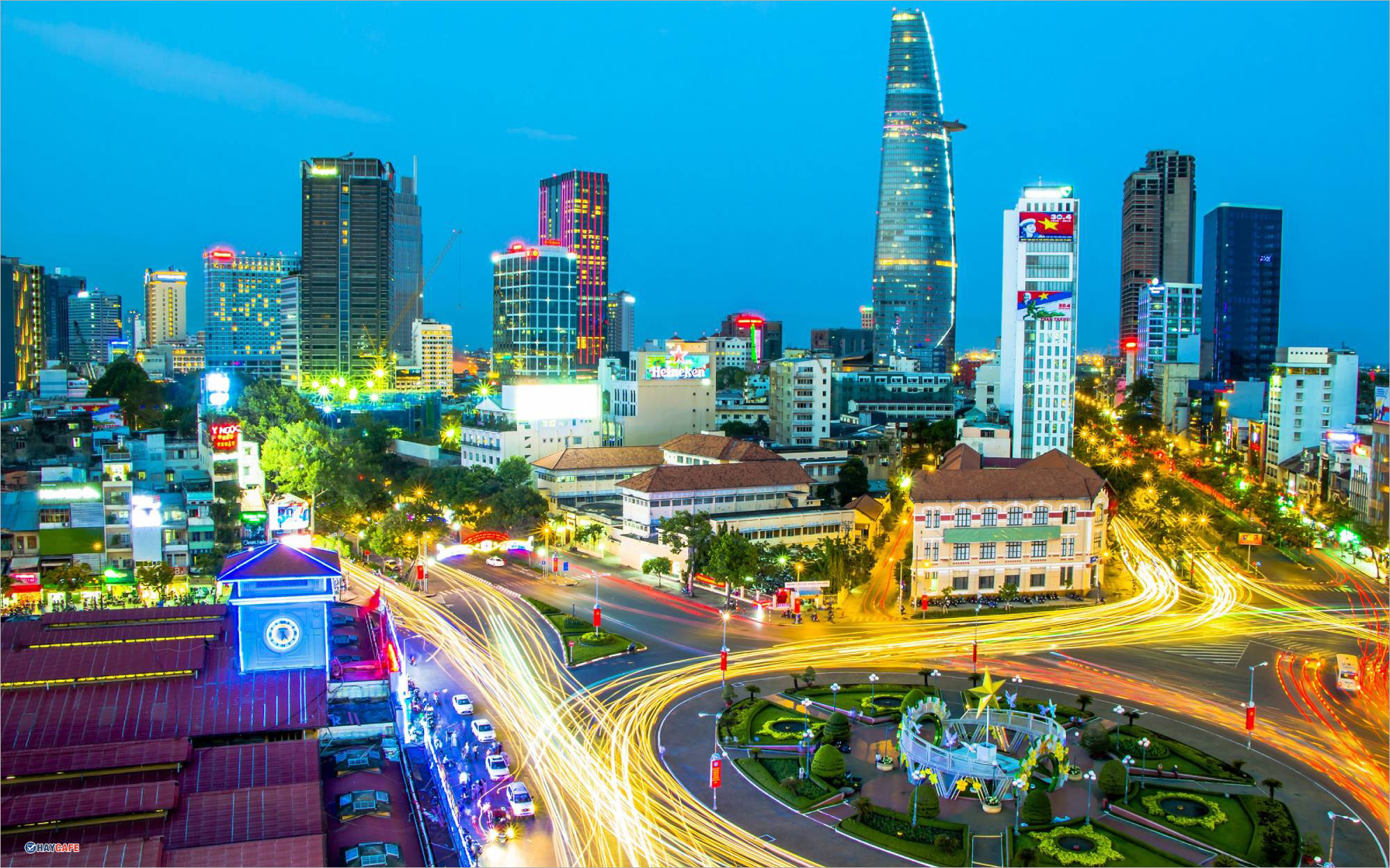 The streets of Saigon — a chaotic river of motorbikes, neon lights, hurried pedestrians — radiating energy and speed