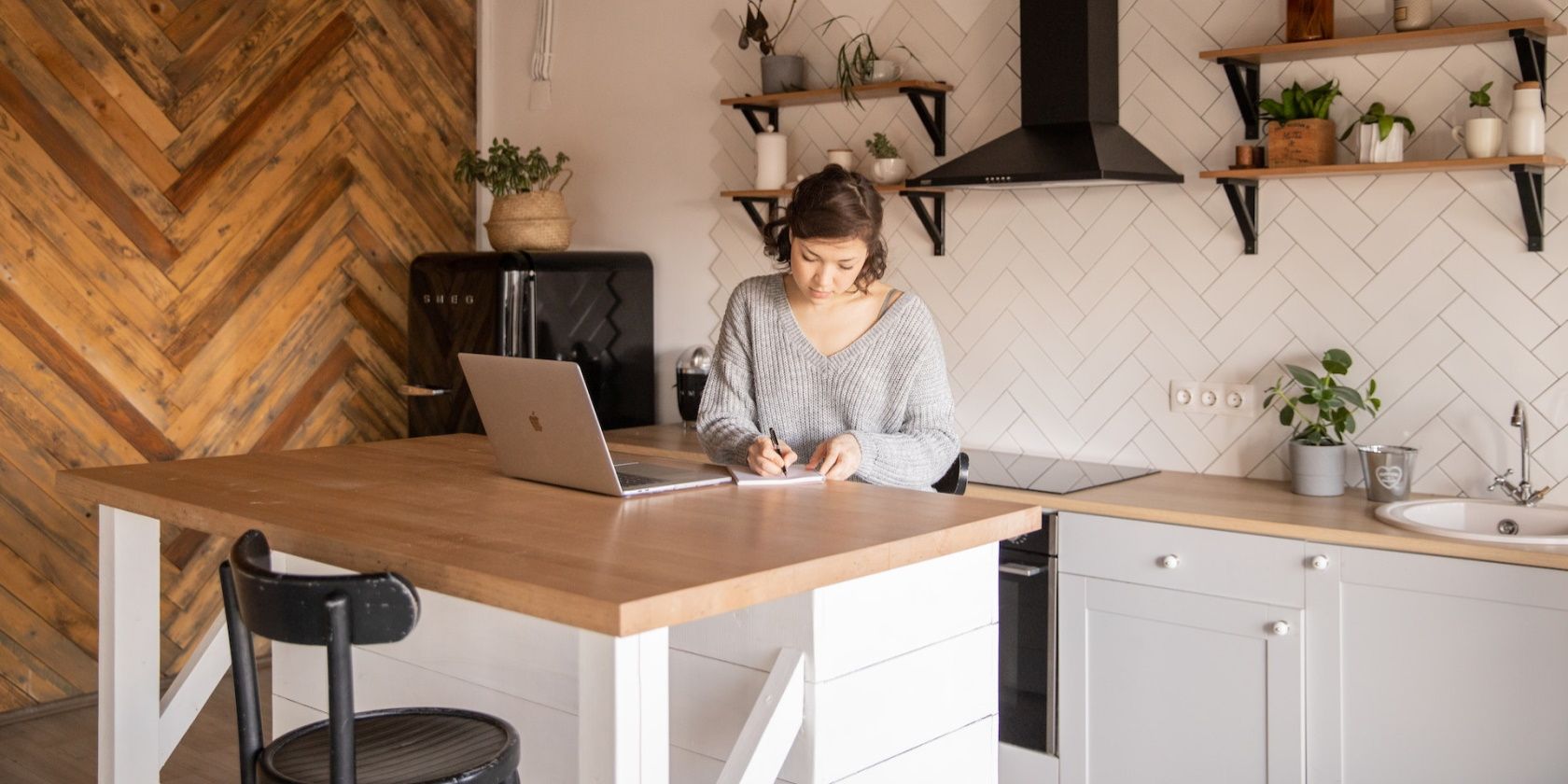 A Vietnamese woman operating in an office environment, then returning home to cook — executing dual roles within a single day