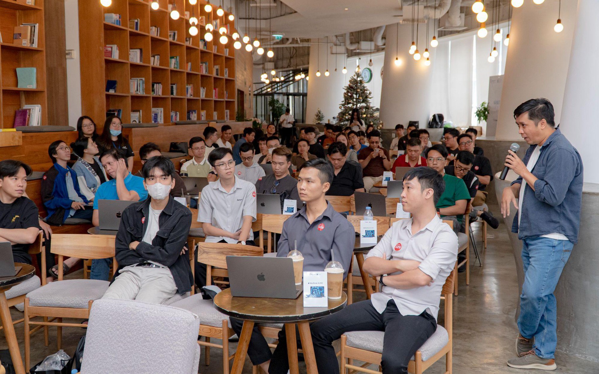 Young Vietnamese participating in a mental health workshop — an open, supportive small-group environment